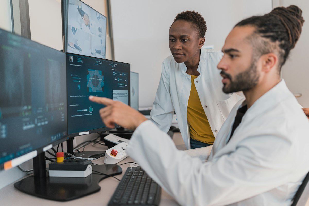 Medical physicists reviewing treatment images